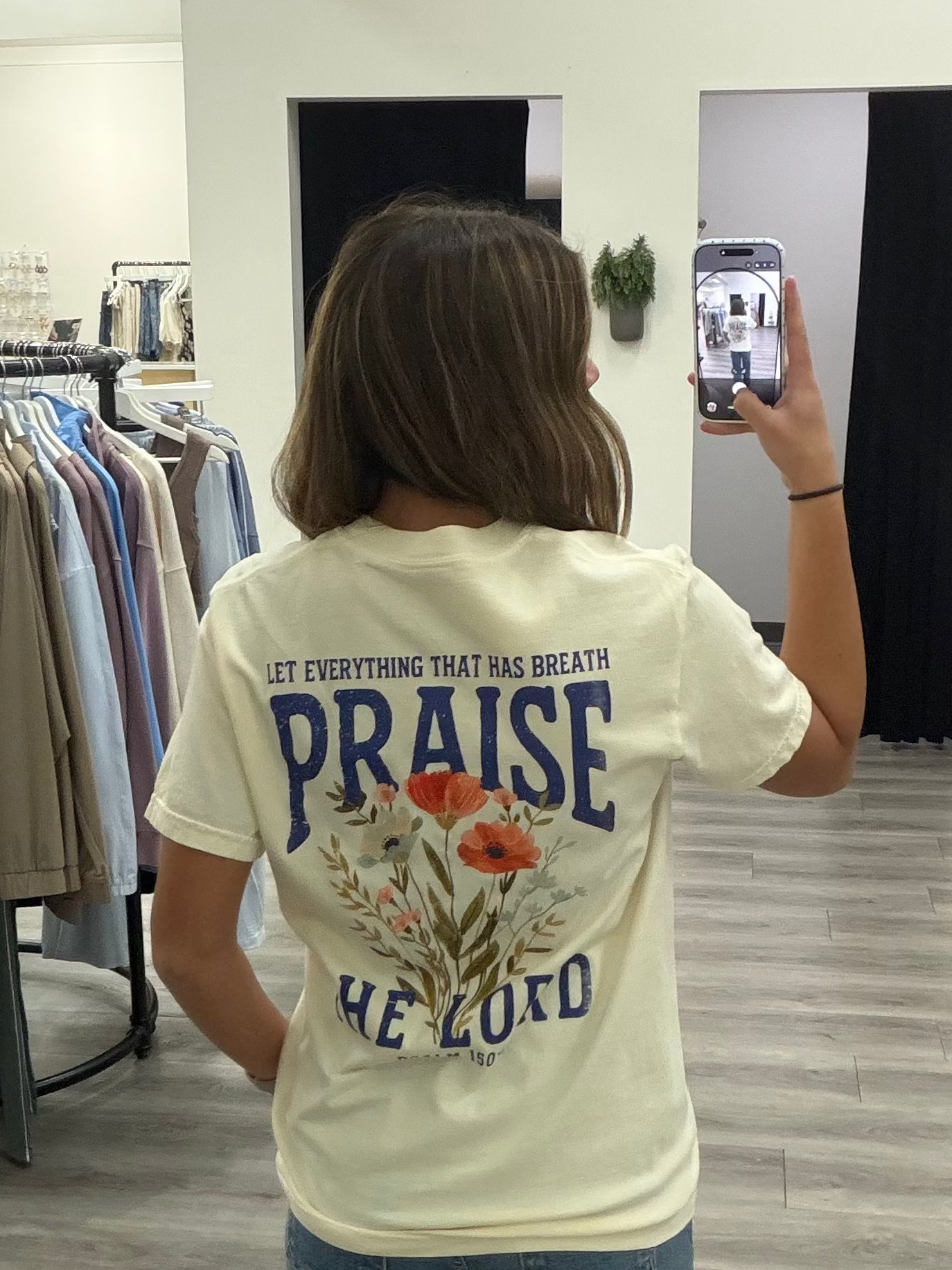 Back view of model wearing Praise The Lord graphic tee with plain back — Three:Twelve Boutique