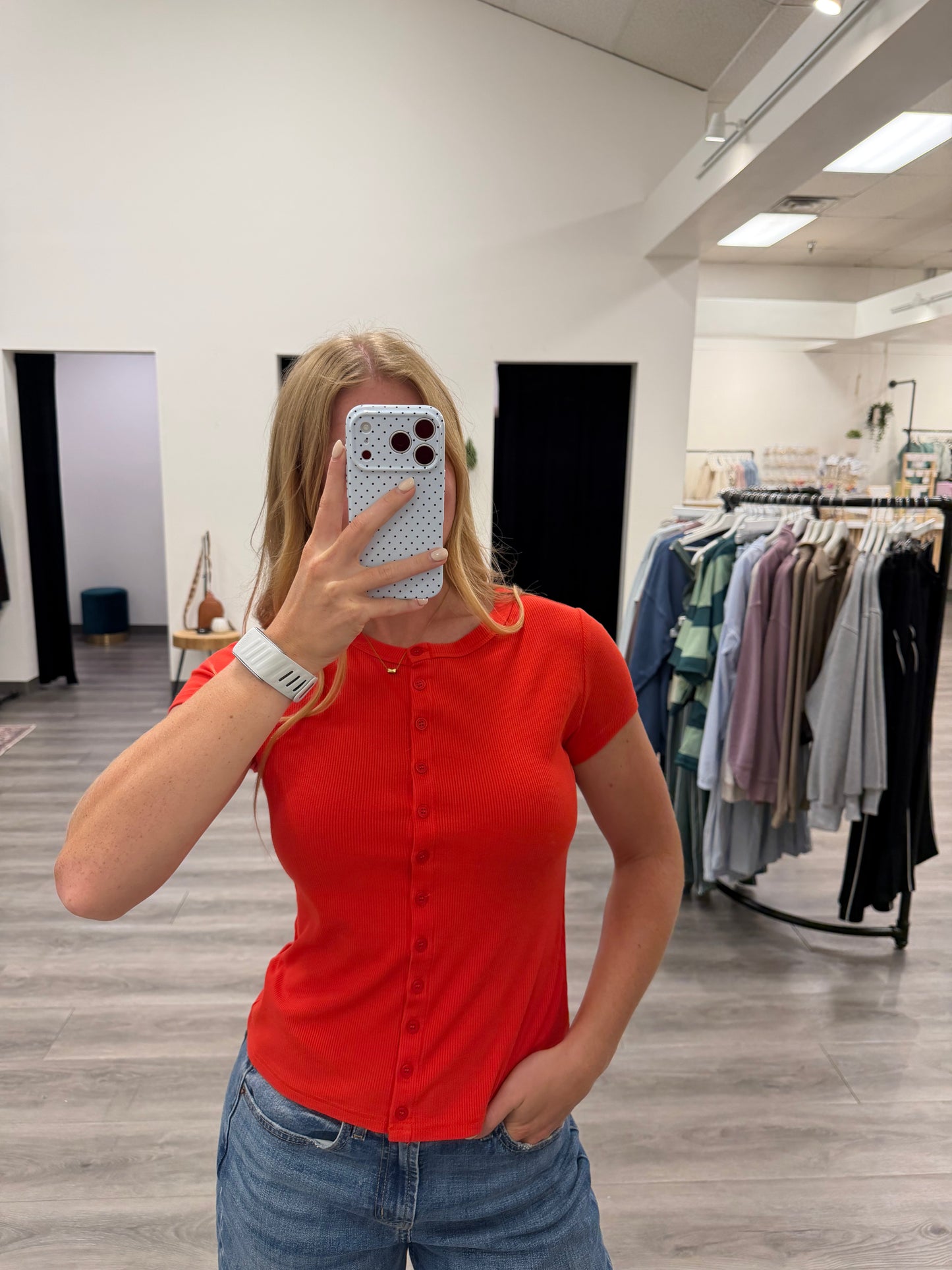 Front view of model wearing Button Down Short Sleeve Shirt for Women with collared neckline and button-front design