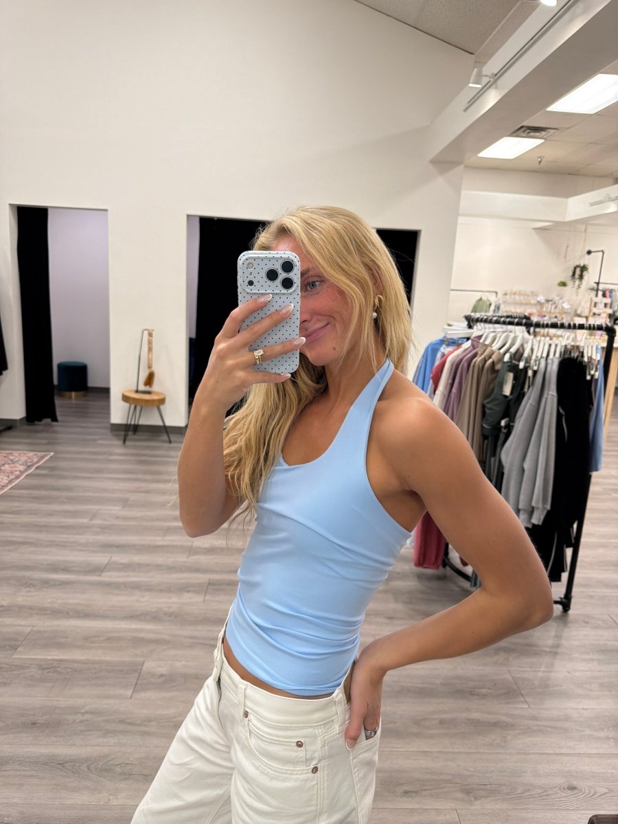 Side view of fitted Clean Line Halter Top showing clean seamless shape — Three:Twelve Boutique