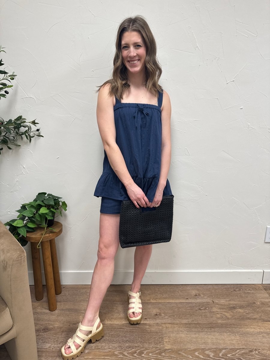Lifestyle shot of model wearing cotton lounge set in casual setting — Three:Twelve Boutique