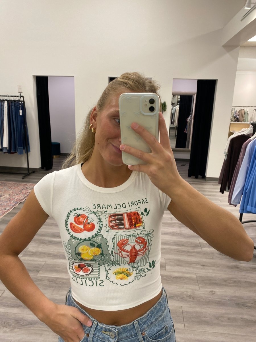 Lifestyle shot of model wearing Sardine tee styled with casual outfit — Three:Twelve Boutique