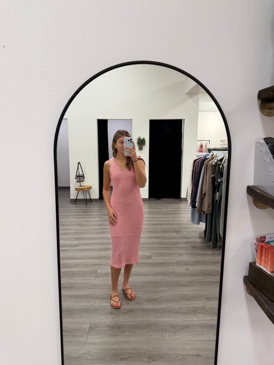 Front view of sleeveless V neck textured midi dress on model showing full length — Three:Twelve Boutique