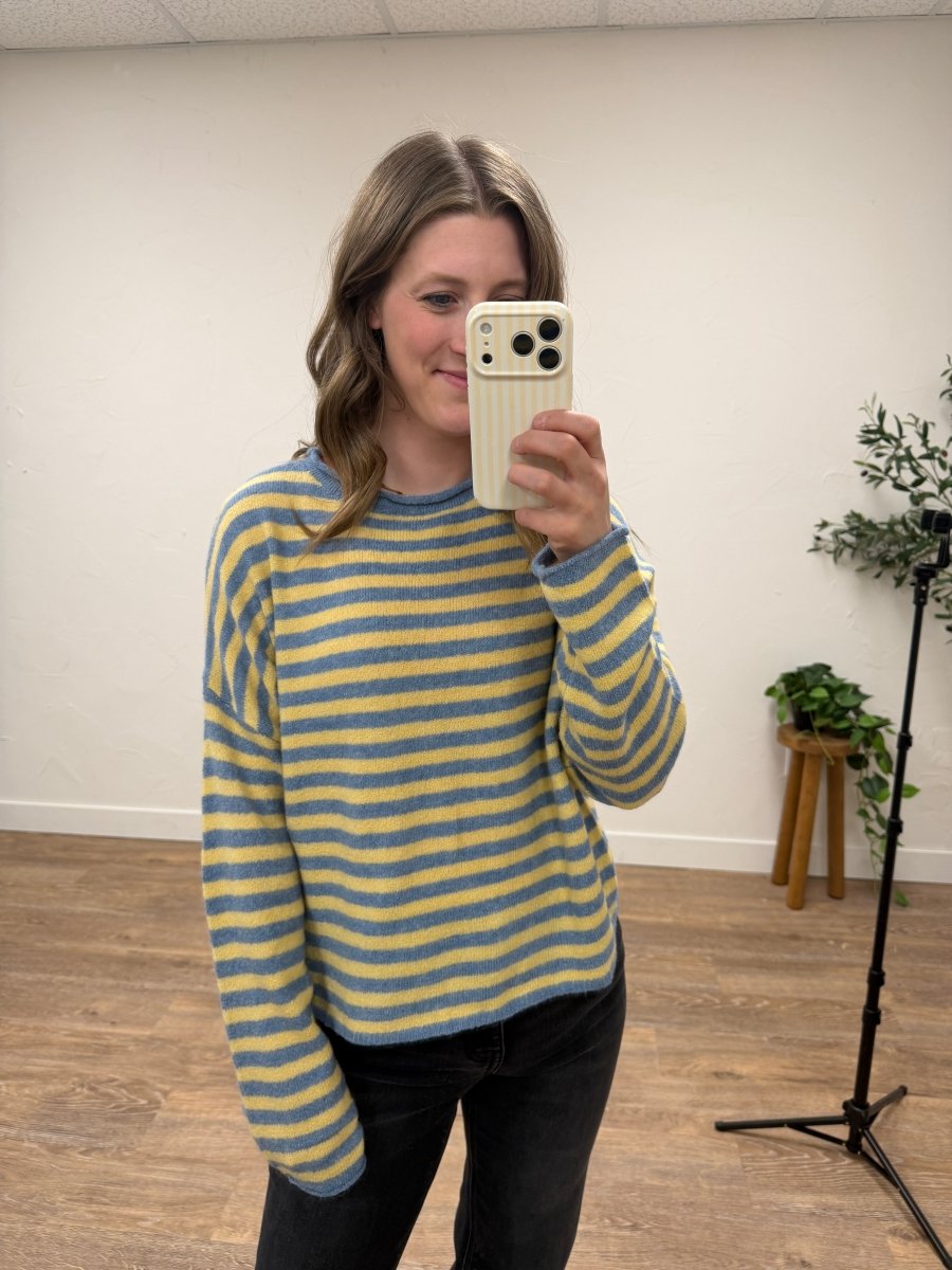 Front view of model wearing striped pullover sweater showing relaxed fit — Three:Twelve Boutique