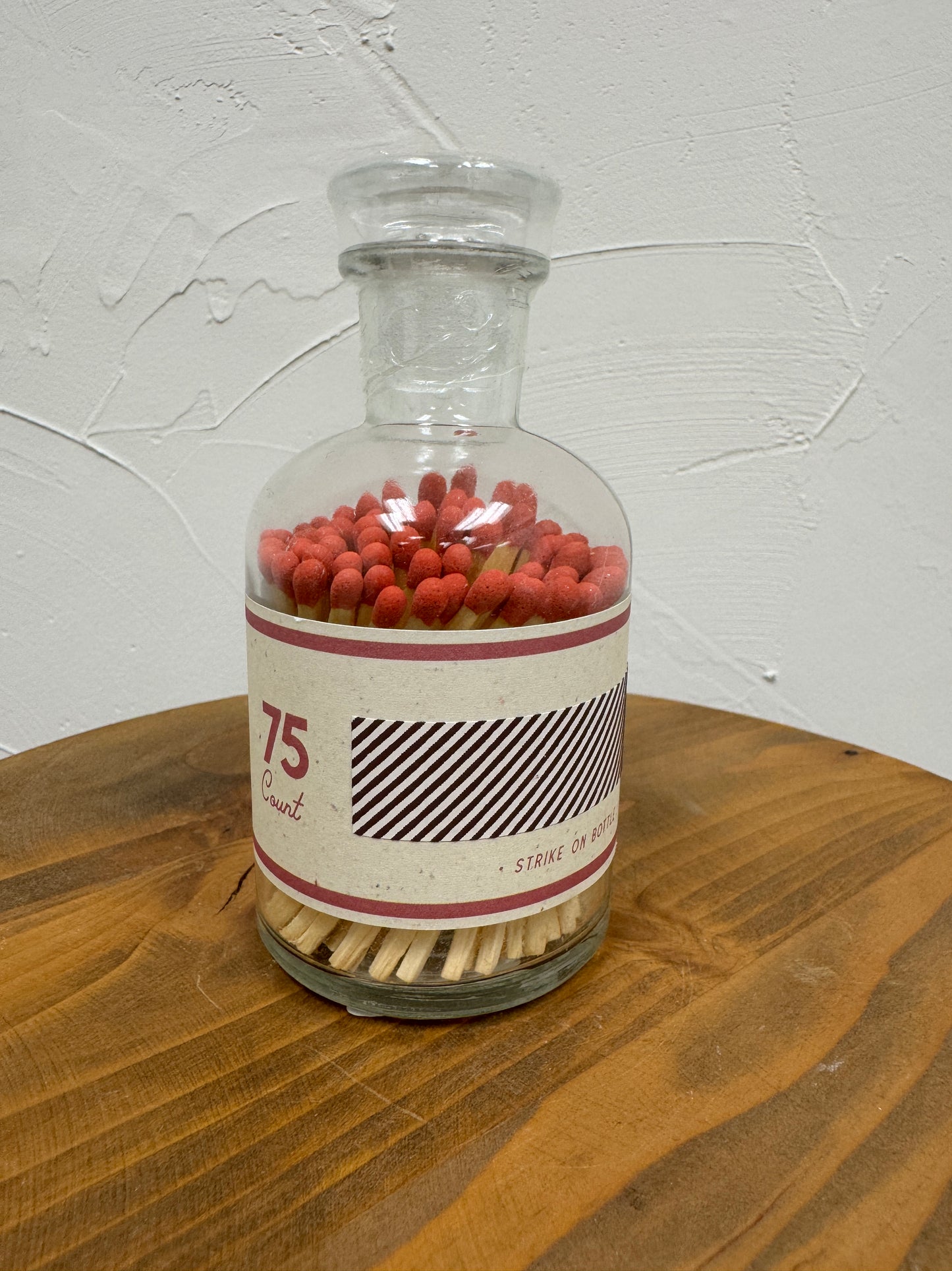 Red Matches in Glass Container