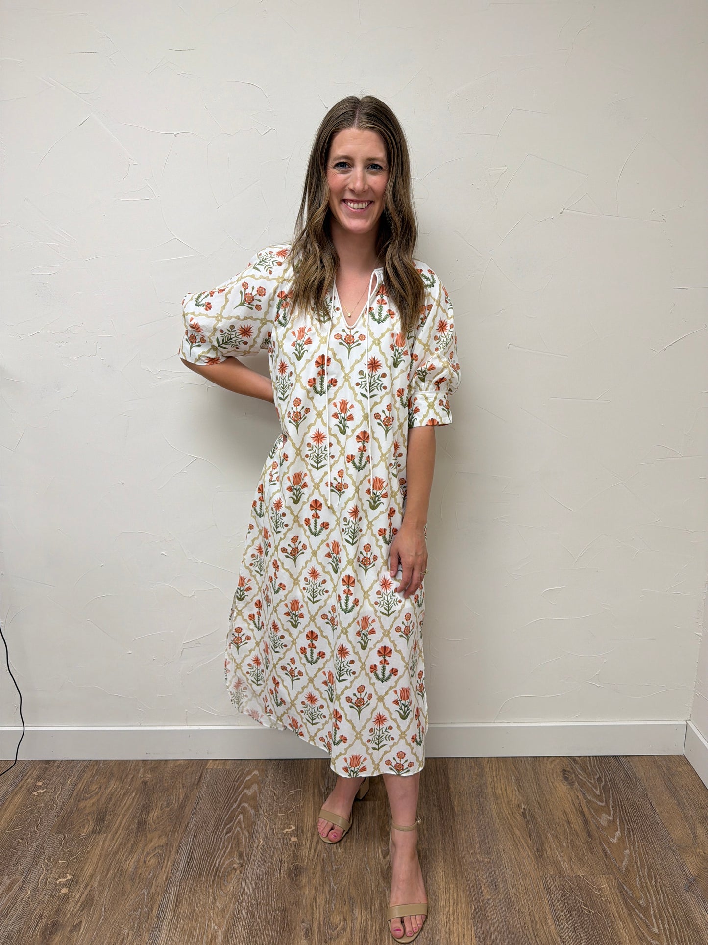 Floral print half sleeve midi dress featuring button detail
