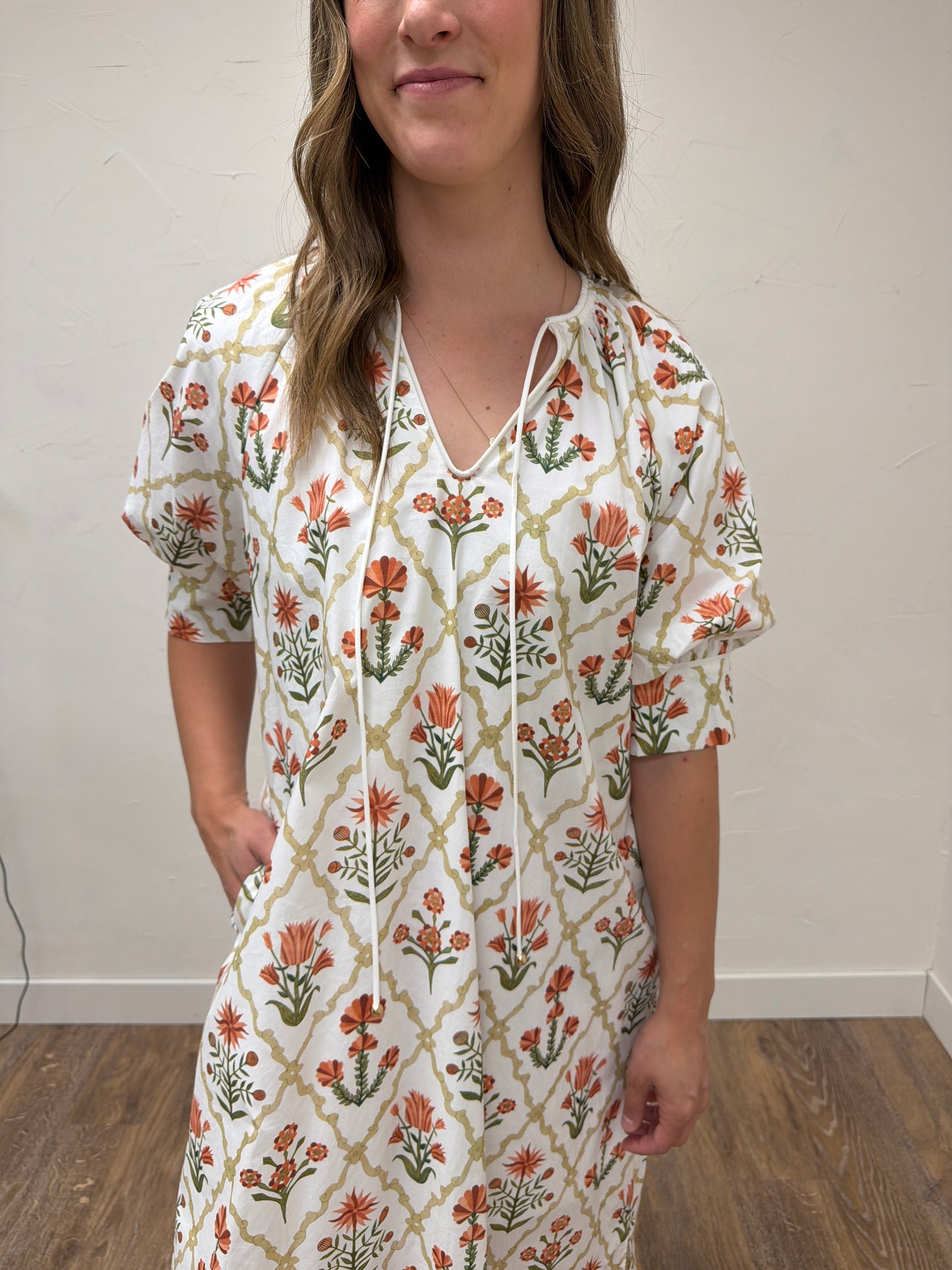 Floral print half sleeve midi dress featuring button detail