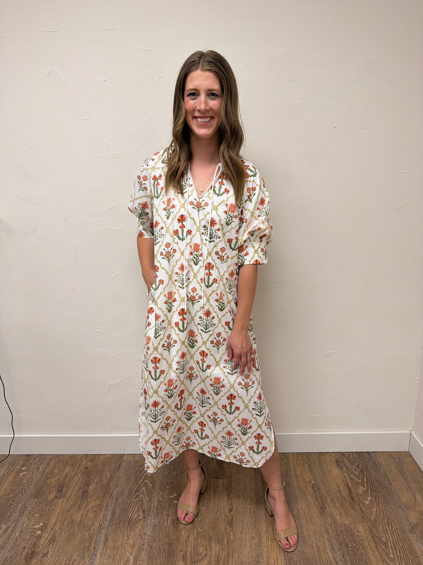 Floral print half sleeve midi dress featuring button detail