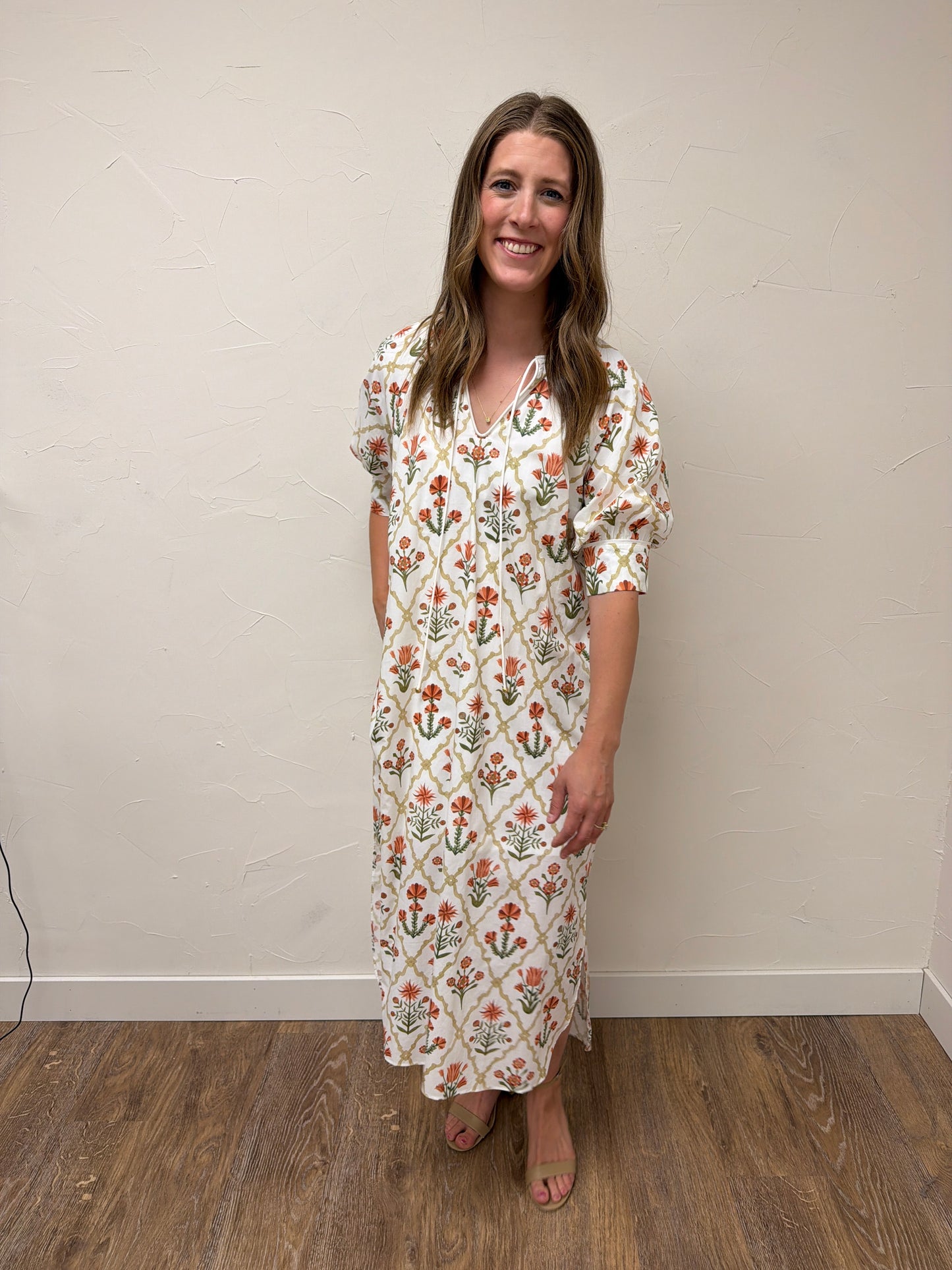 Floral print half sleeve midi dress featuring button detail