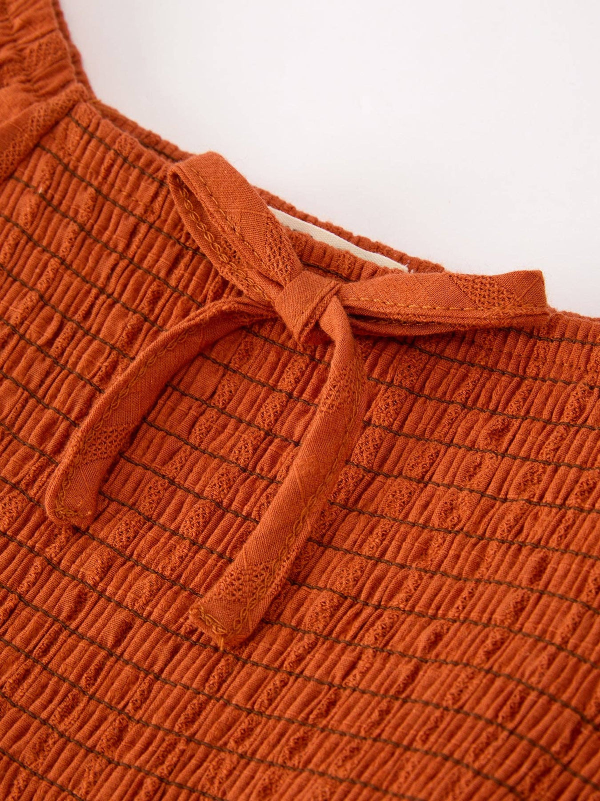 Rust Smocked Lace Trim Ruffle Dress