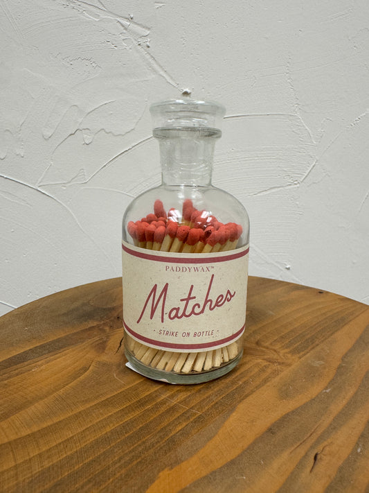Red Matches in Glass Container