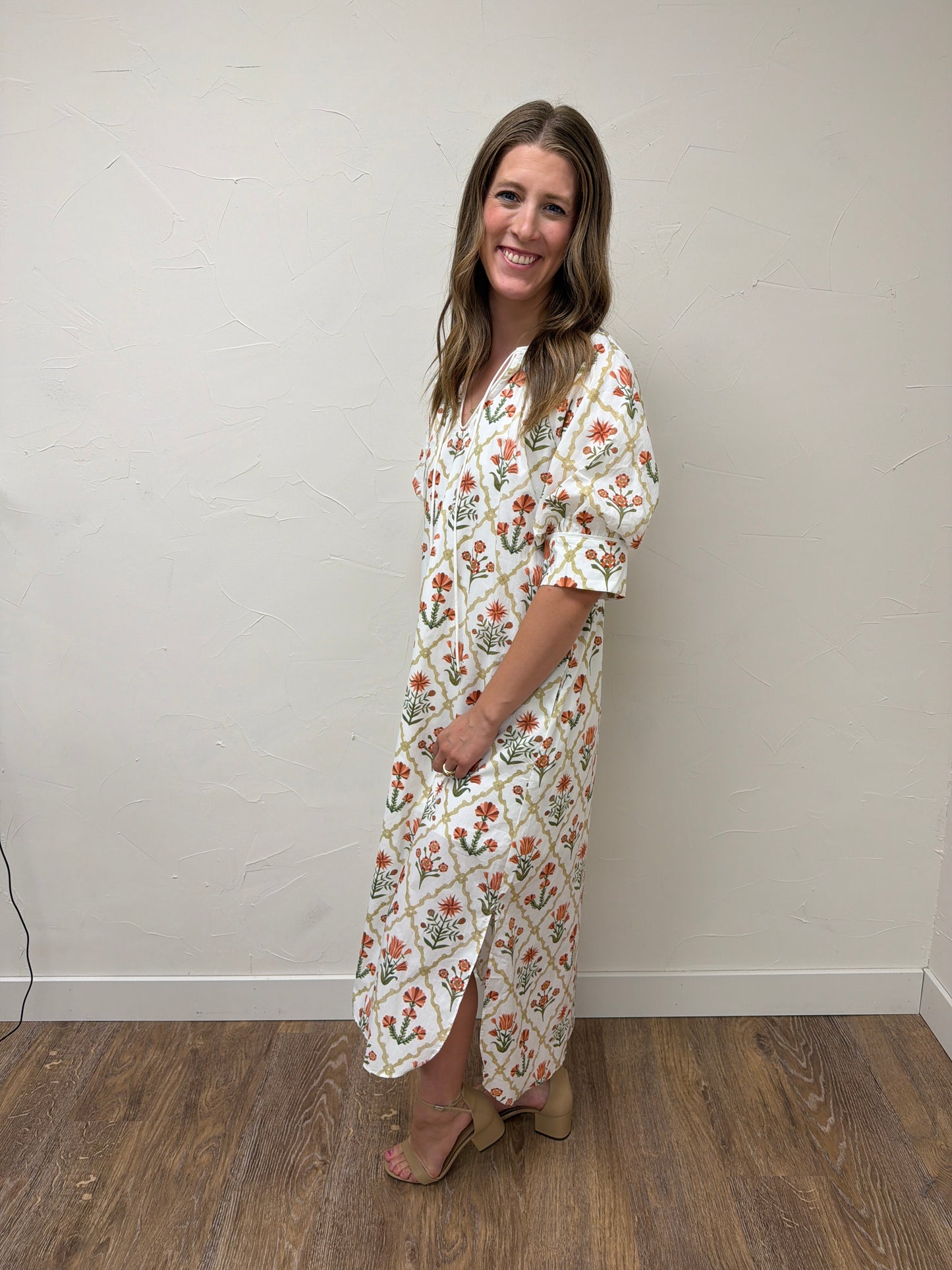 Floral print half sleeve midi dress featuring button detail
