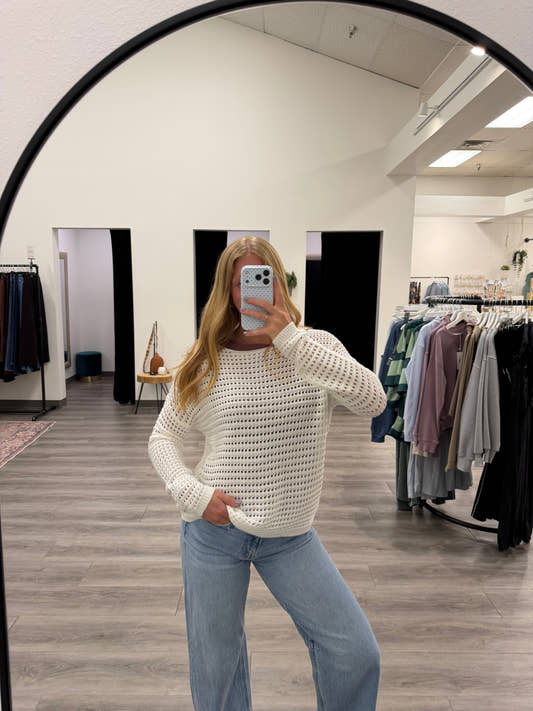 Model wearing Wide Crew Neck Crochet Pullover for Women styled for a casual everyday look