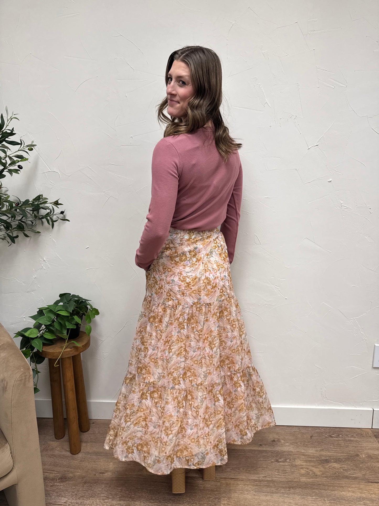 Back view of Tiered Boho Maxi Skirt on model showing flow and length — Three:Twelve Boutique