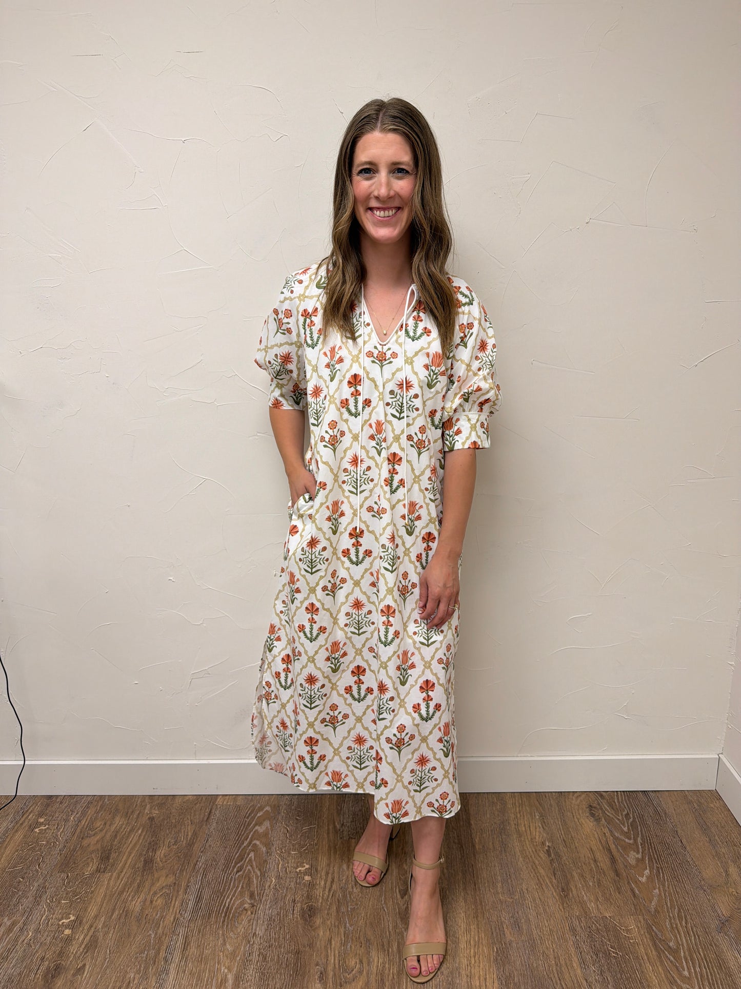 Floral print half sleeve midi dress featuring button detail