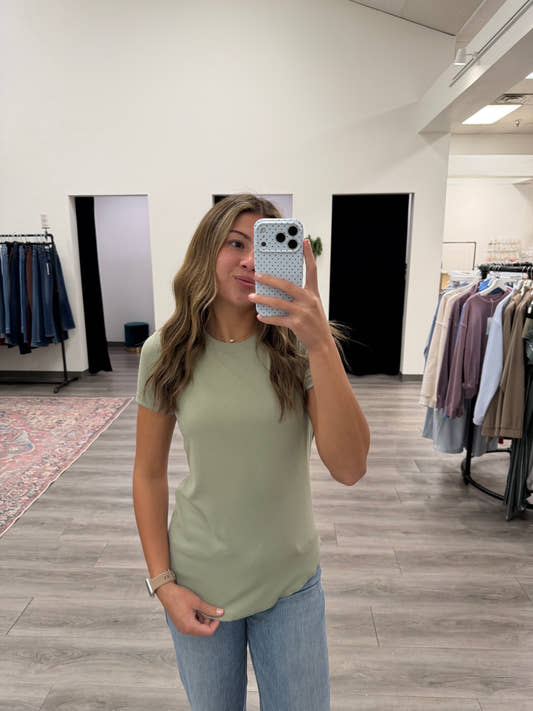 Front view of model wearing ribbed crew neck tee showing fitted silhouette — Three:Twelve Boutique