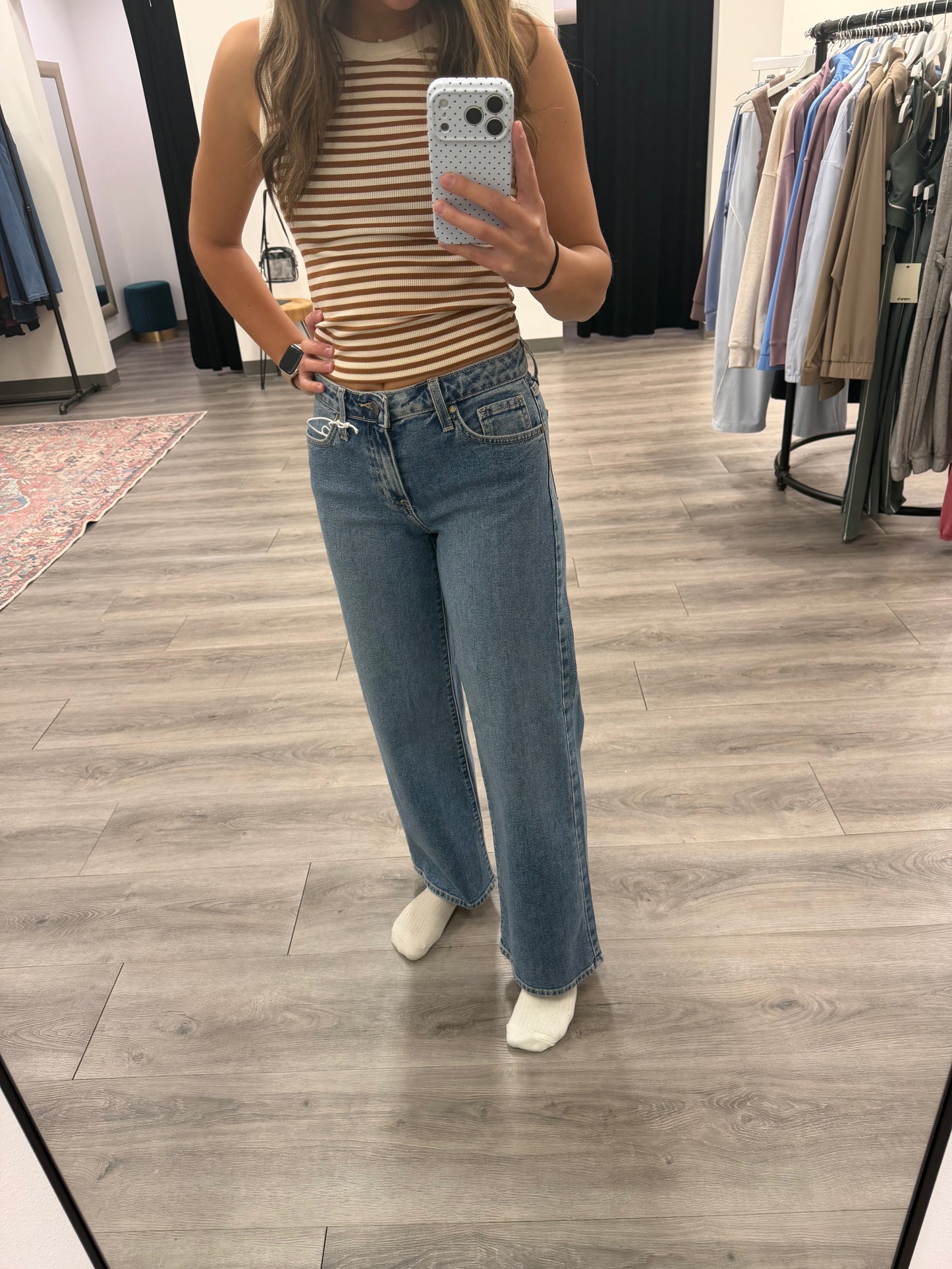 Front view of model wearing mid rise slim wide leg denim jeans — Three:Twelve Boutique