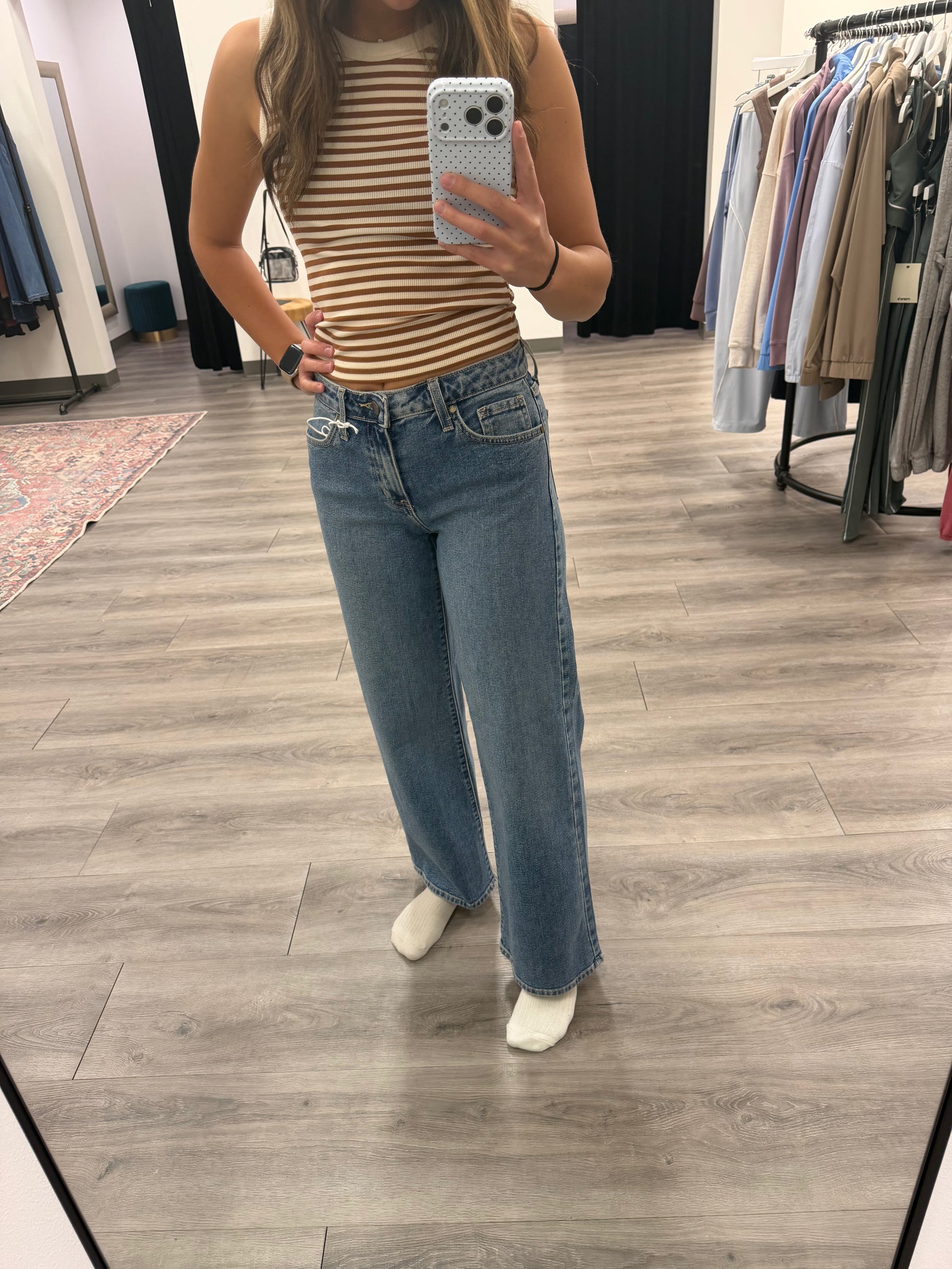 Front view of model wearing mid rise slim wide leg denim jeans — Three:Twelve Boutique