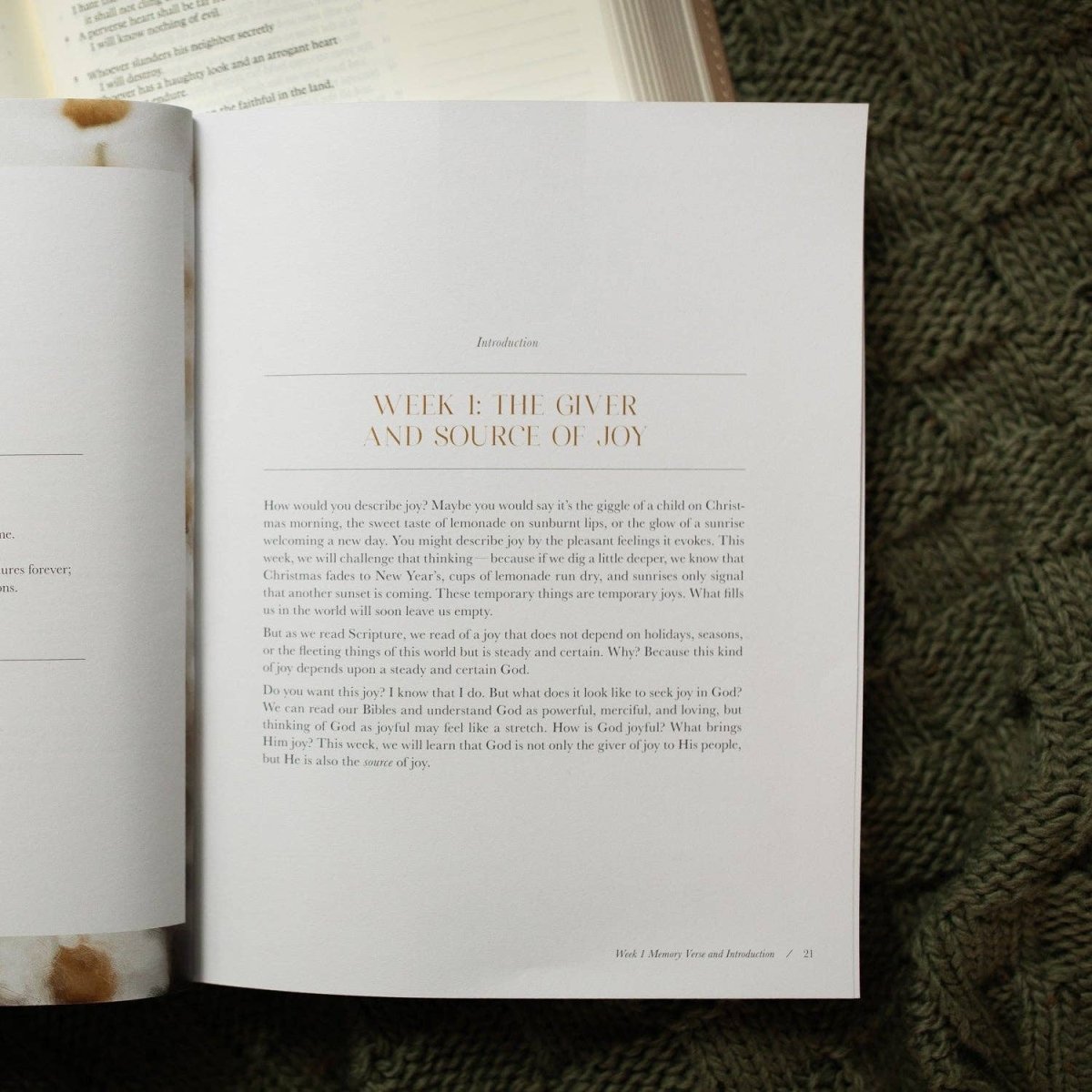 Flat lay of Bible study book on textured fabric with notebook and pen — Three:Twelve Boutique