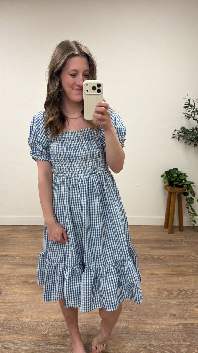 Lifestyle shot of model wearing Alice gingham dress styled for casual day wear — Three:Twelve Boutique