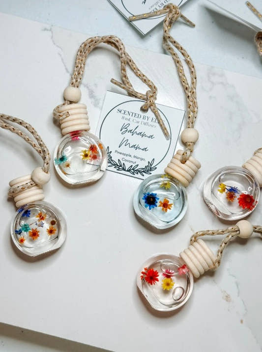 Front view of Bahama Mama car diffuser bottle with hanging string — Three:Twelve Boutique