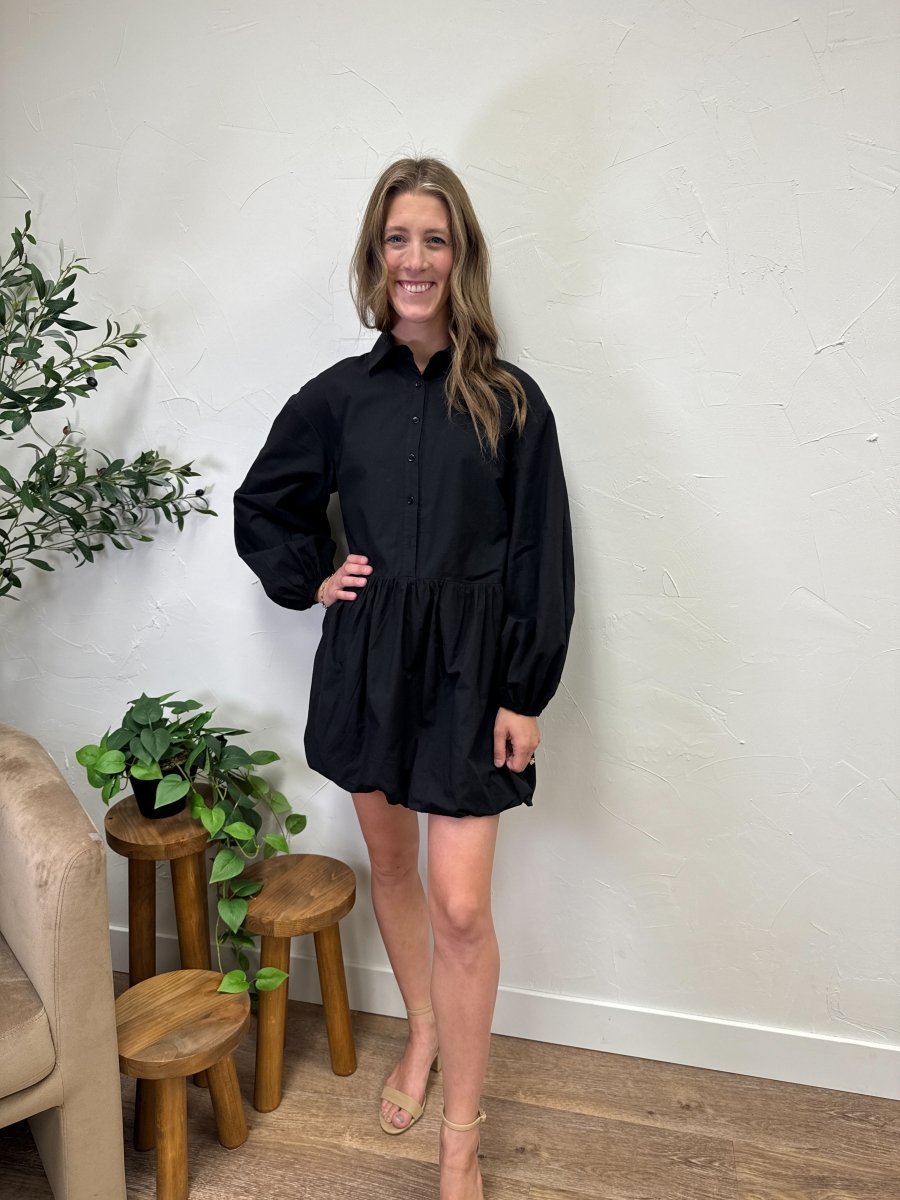 Lifestyle shot of model wearing balloon bottom mini dress with casual styling — Three:Twelve Boutique