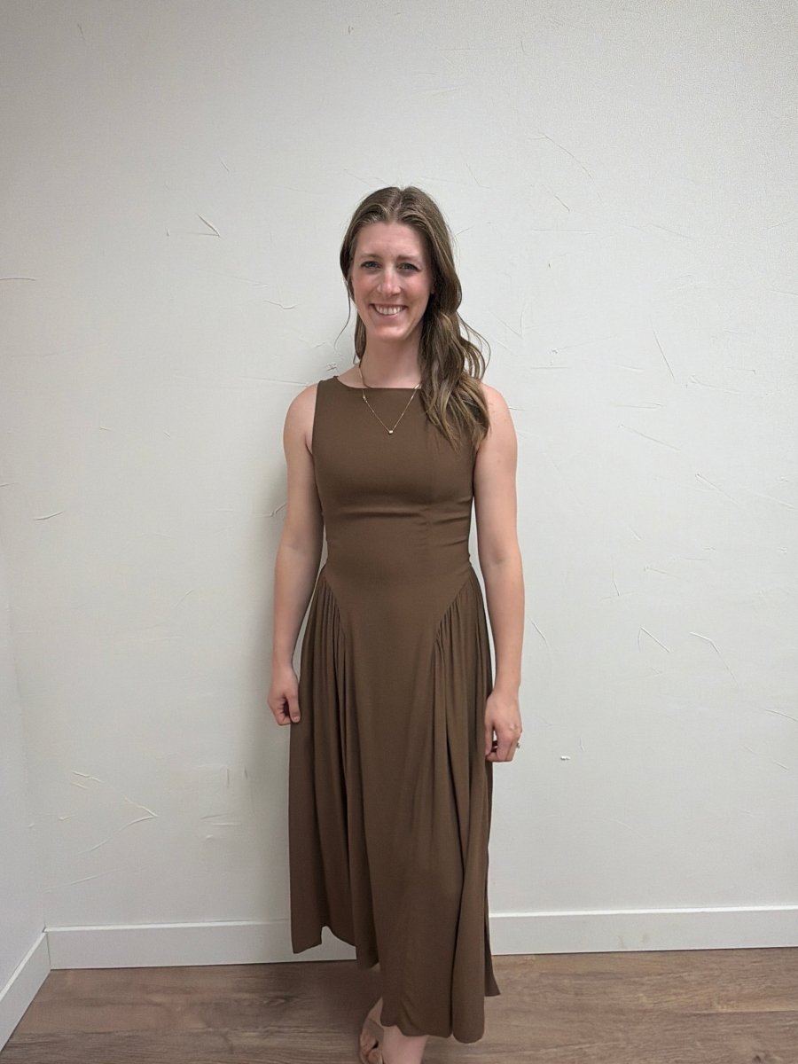 Lifestyle view of model wearing Boat Neck Sleeveless Midi Dress in elegant setting — Three Boutique