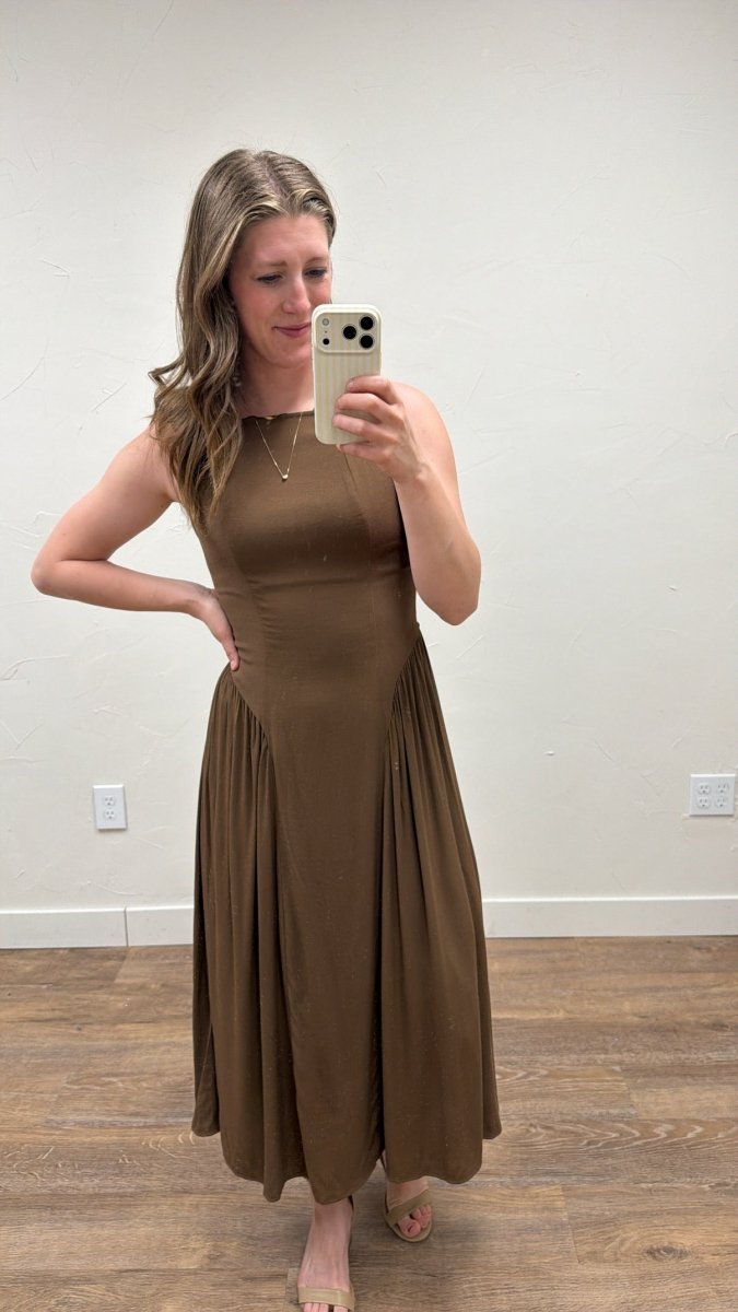 Lifestyle view of model wearing Boat Neck Sleeveless Midi Dress in elegant setting — Three Boutique