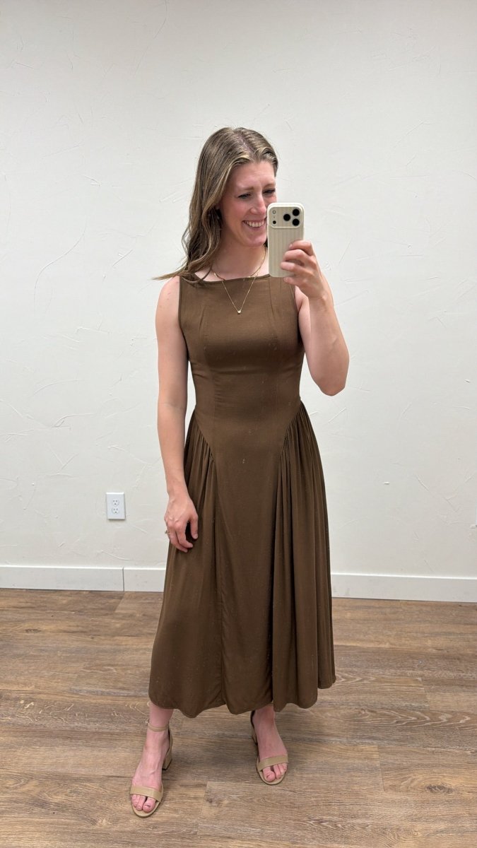 Lifestyle view of model wearing Boat Neck Sleeveless Midi Dress in elegant setting — Three Boutique