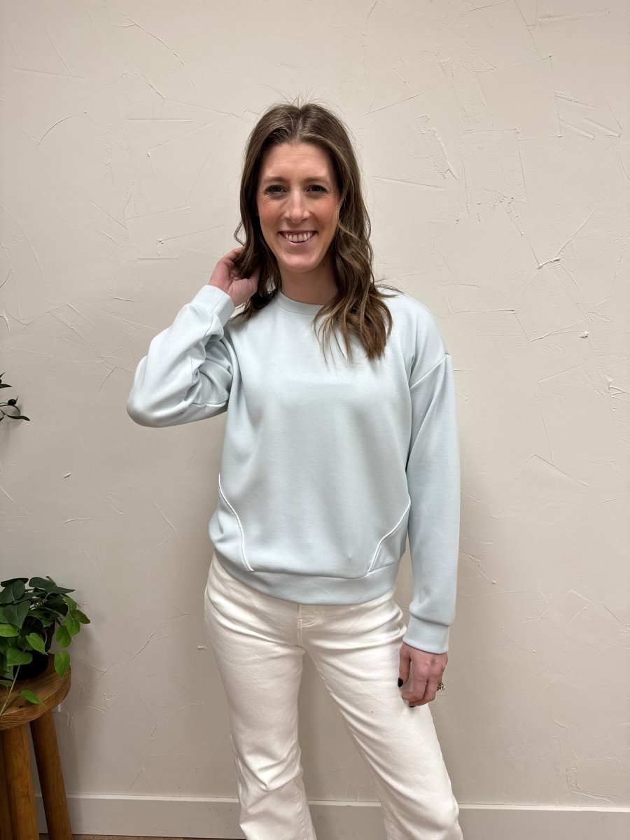 Lifestyle shot of model wearing Britney Top styled with casual outfit — Three:Twelve Boutique