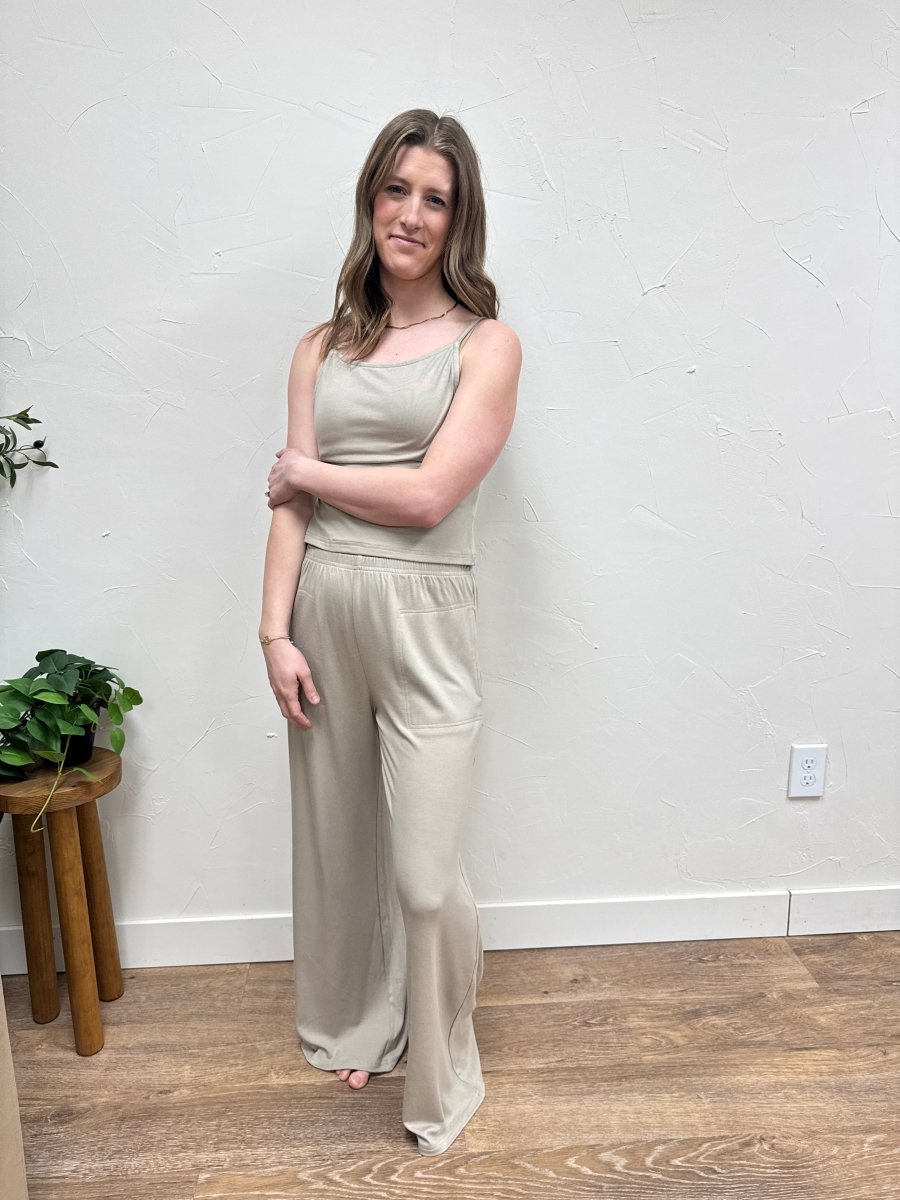 Lifestyle shot of model wearing casual wide leg pants styled with matching tank top — Three:Twelve Boutique