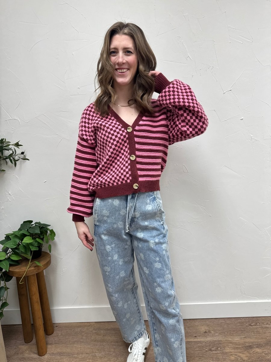 Lifestyle shot of model wearing checkered cardigan styled casually – Three:Twelve Boutique