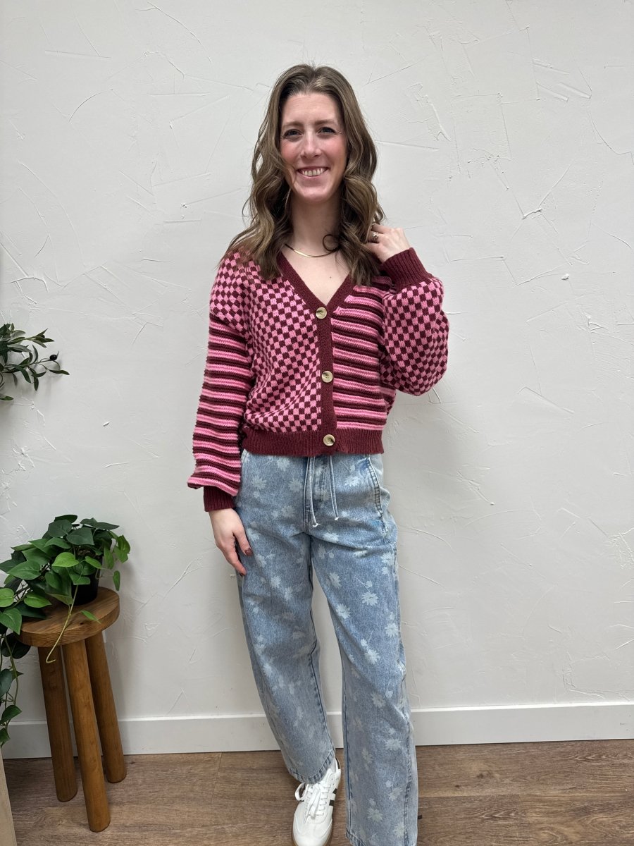 Lifestyle shot of model wearing checkered cardigan styled casually – Three:Twelve Boutique