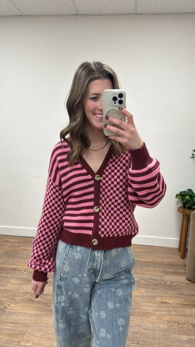 Front view of checkered and striped button down cardigan on model – Three:Twelve Boutique