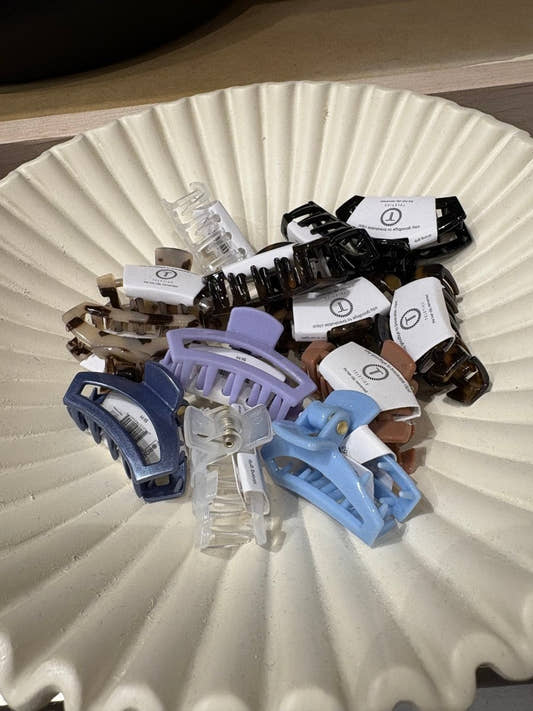 Top view of assorted tiny hair claws arranged together — Three:Twelve Boutique