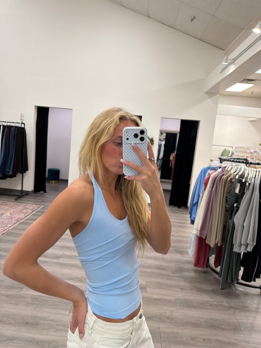 Side view of fitted Clean Line Halter Top showing clean seamless shape — Three:Twelve Boutique