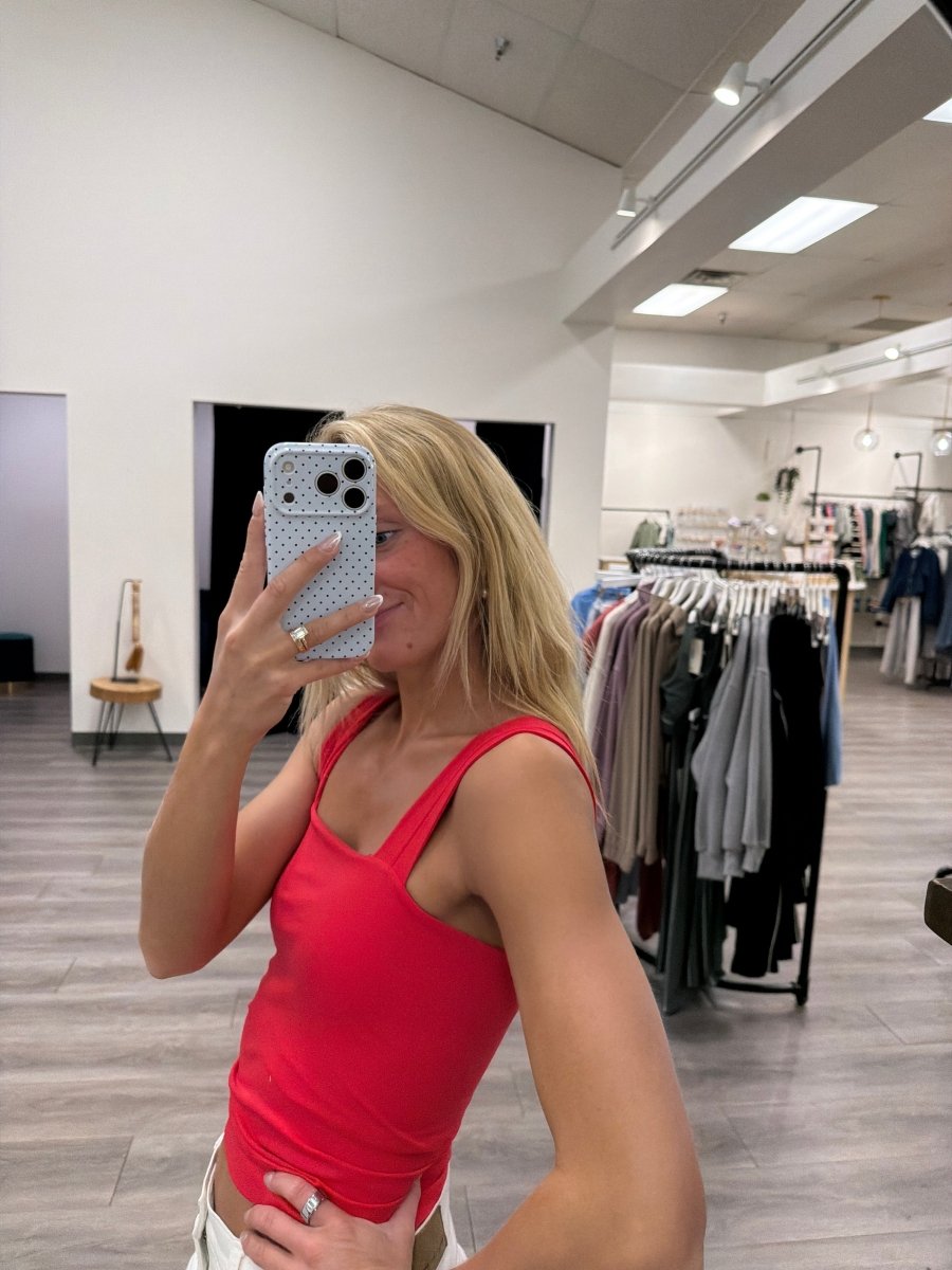 Side view of model wearing Clean Line Square Tank — Three Boutique
