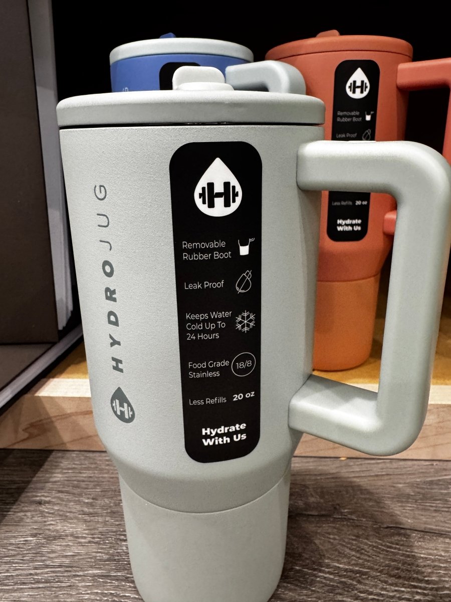Front view of Cloud HydroJug 20 oz traveler tumbler showing flip straw lid and handle — Three:Twelve Boutique
