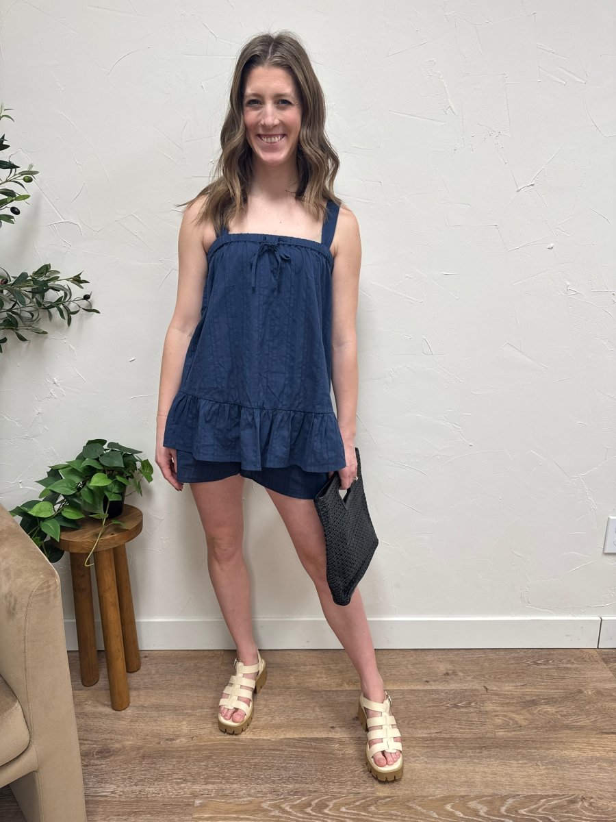 Lifestyle shot of model wearing cotton lounge set in casual setting — Three:Twelve Boutique