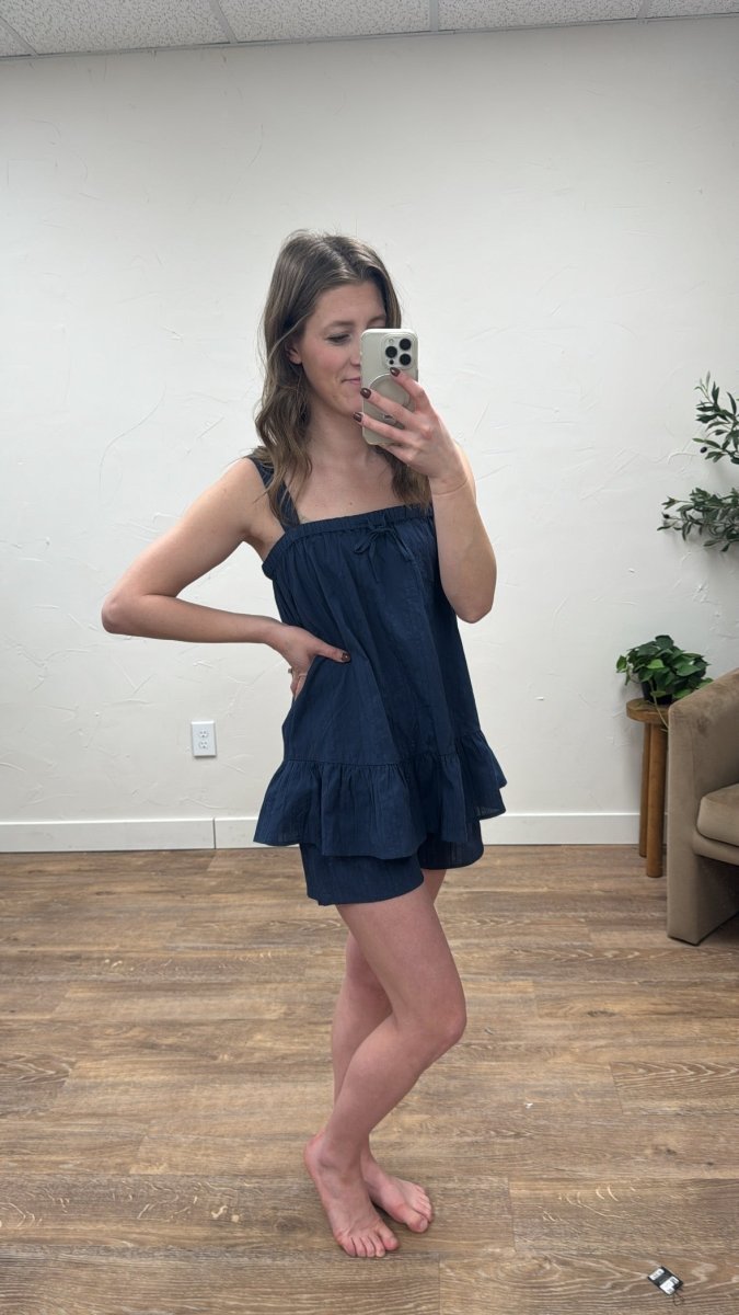 Lifestyle shot of model wearing cotton lounge set in casual setting — Three:Twelve Boutique