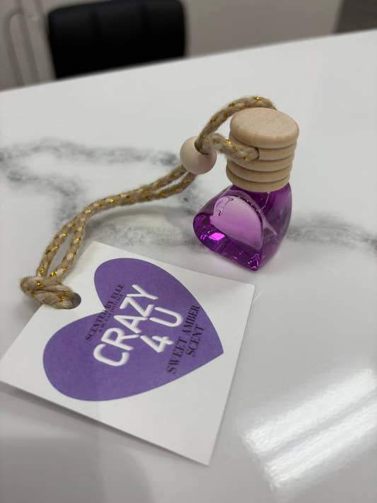 Front view of Crazy 4 U Sweet Amber car diffuser bottle with hanging cord — Three:Twelve Boutique