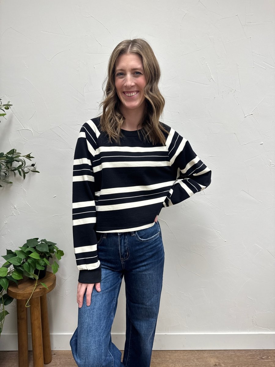 Front view of model wearing Dakota striped pullover showing horizontal stripe pattern — Three:Twelve Boutique