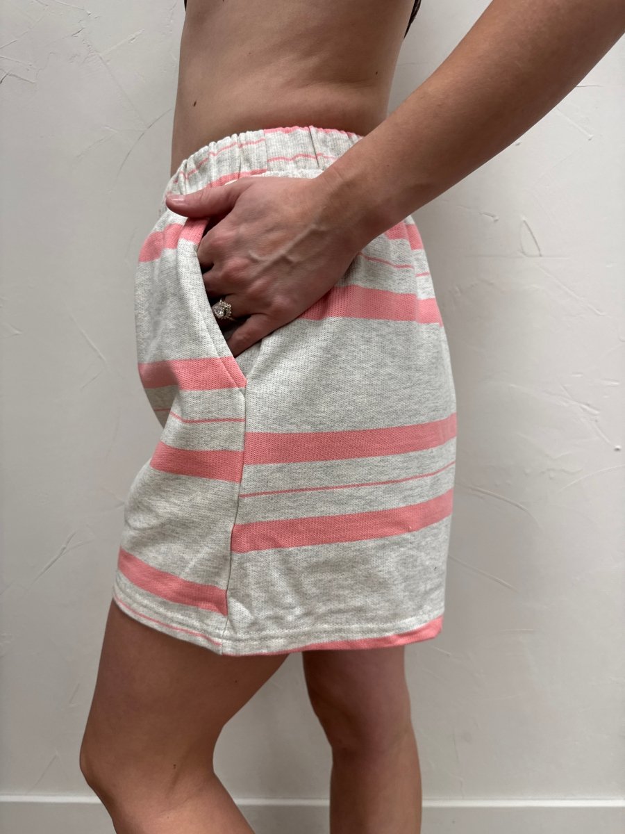 Side view of Dakota striped shorts highlighting length and silhouette — Three:Twelve Boutique
