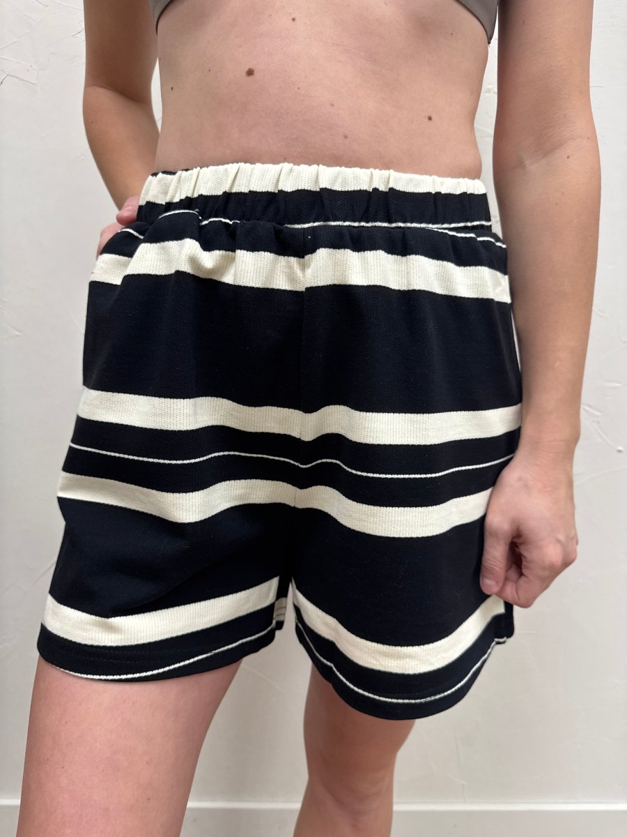 Front view of Dakota striped shorts on model — Three:Twelve Boutique
