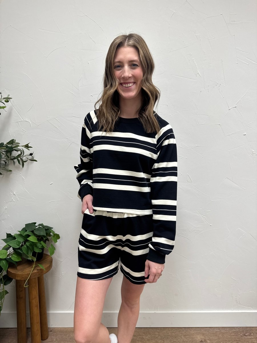 Lifestyle view of model wearing Dakota striped shorts styled casually — Three:Twelve Boutique