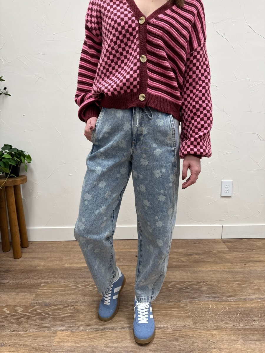 Front view of model wearing Dandelion washed denim drawstring jeans — Three:Twelve Boutique