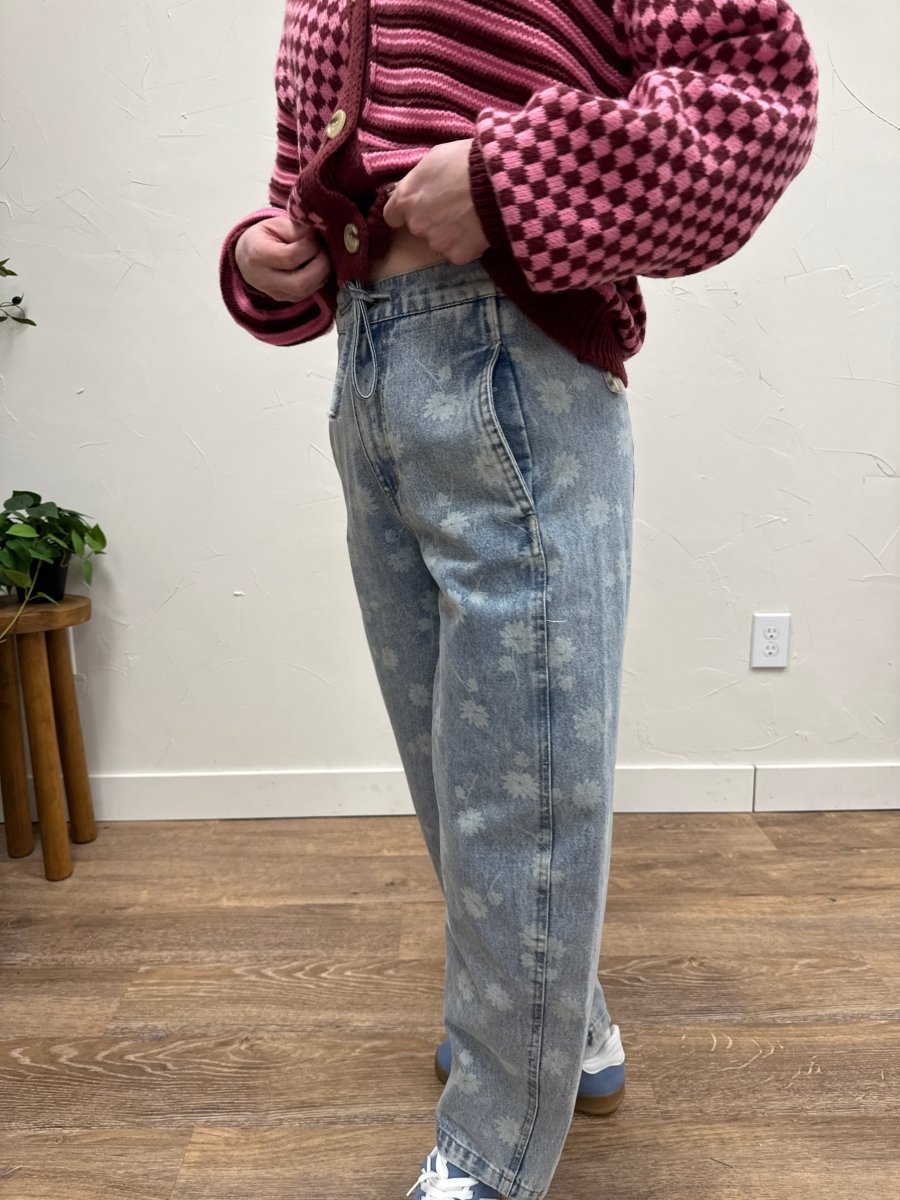 Side view of relaxed fit denim jeans showing straight leg silhouette — Three:Twelve Boutique