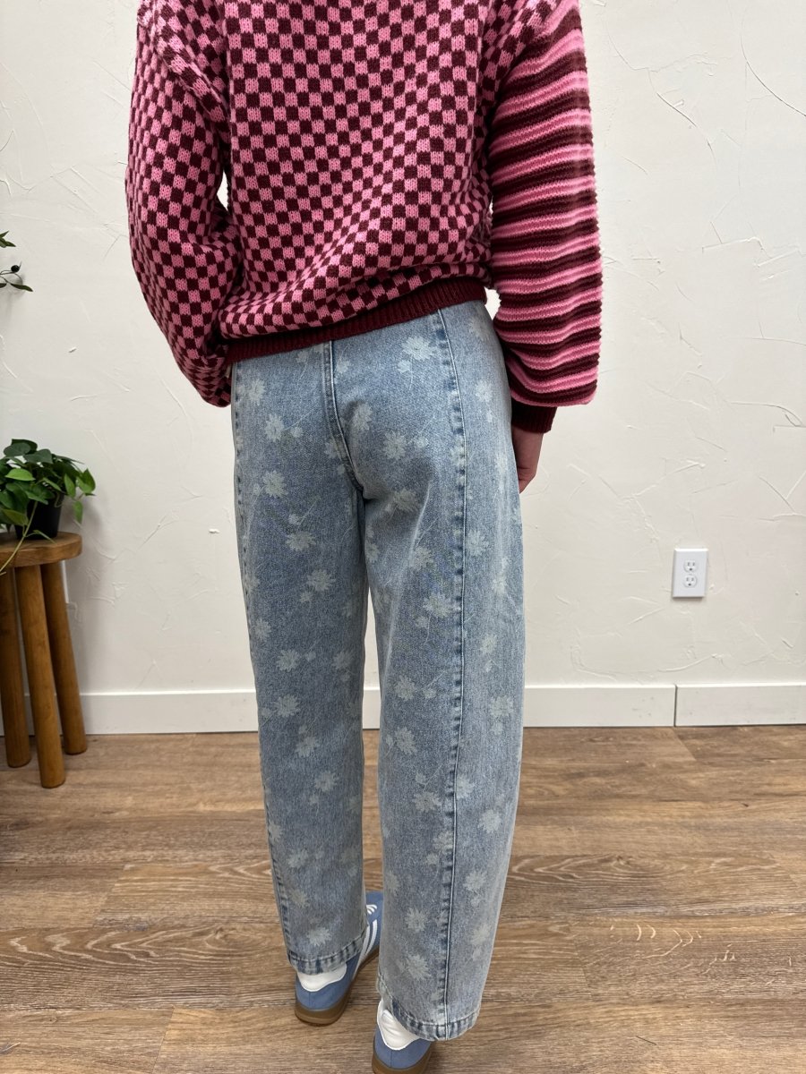 Back view of model wearing relaxed fit denim jeans with drawstring waist — Three:Twelve Boutique