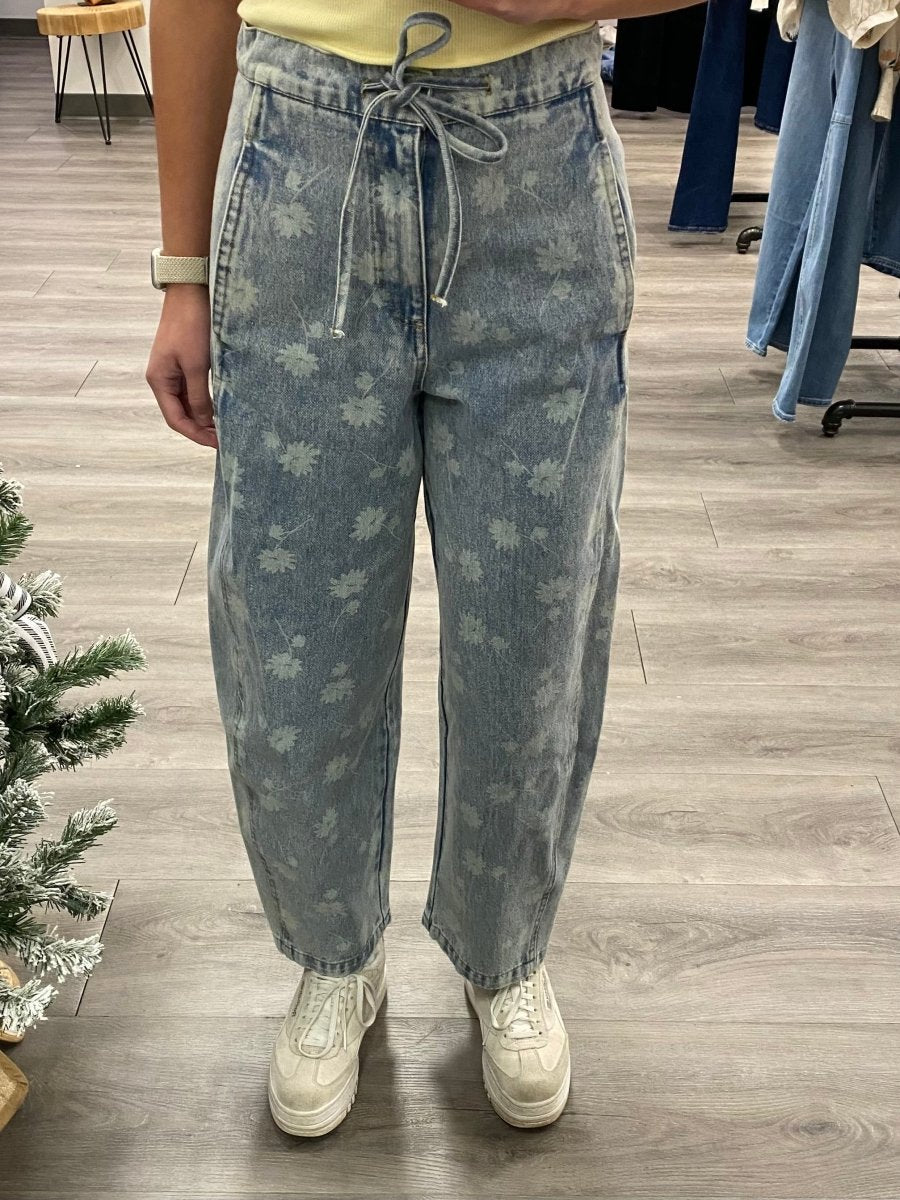 Front view of model wearing Dandelion washed denim drawstring jeans — Three:Twelve Boutique
