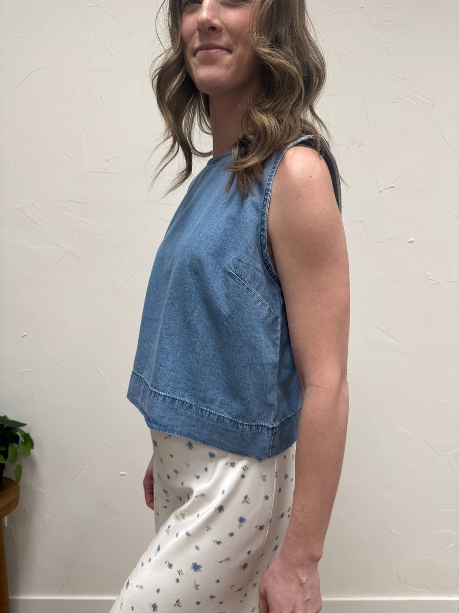Side angle view of denim tank top showing fit and structure — Three:Twelve Boutique