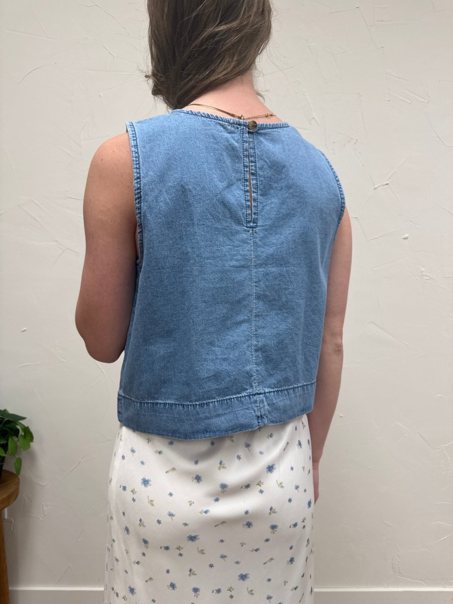 Back view of denim tank top on model highlighting clean structured silhouette — Three:Twelve Boutique